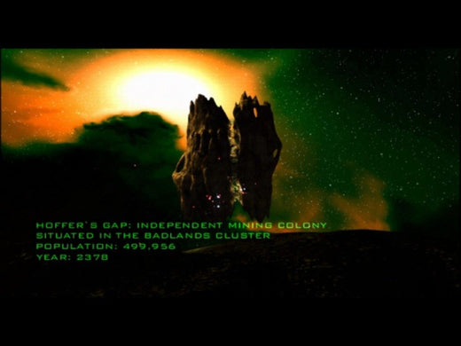In the 2378 backdrop of Hoffers Gap, a rocky outcrop sits under a green sky and sun. The independent mining colony in the Badlands Cluster, with its 499,956 residents, ships rare minerals via USPS. Inspired by Independence War 2: Edge Of Chaos for PC CD.
