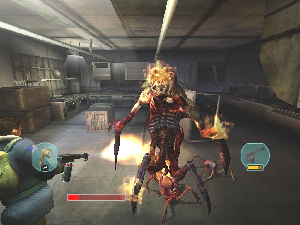 In this intense scene from The Thing for PC, a player character stands in a chaotic kitchen, aiming at a monster. HUD elements show key health and weapon icons, evoking classic encounters.