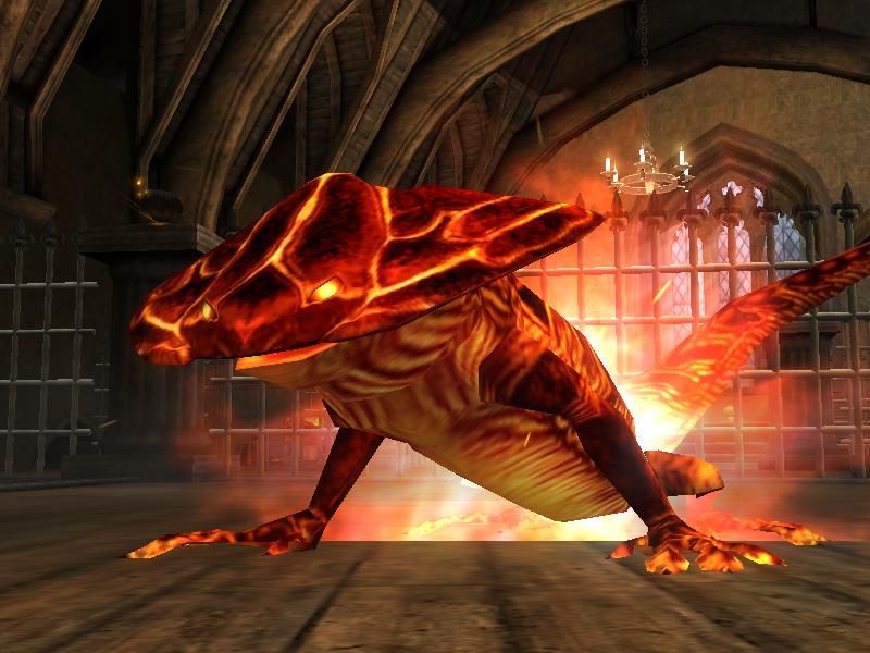 In the dim medieval hall, a fiery salamander-like creature with a glowing, flame-patterned body evokes ancient mysteries, akin to Harry Potter And The Goblet Of Fire Microsoft Windows PC CD in its sleeve, subtly glimmering against stone walls and barred windows.