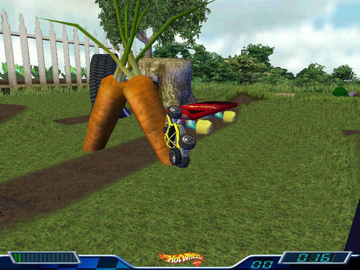 A toy car from the 2000 Hot Wheels - Stunt Track Driver 2 - GET N DIRTY CD for Microsoft Windows PC flipped upside down near carrots in a backyard, with a red ramp nearby. Video game elements at the bottom resemble vibrant classic arcade graphics.