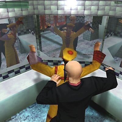 In a tense scene akin to Hitman Codename 47, a person in a black suit strangles another in yellow amidst mirrors, reflecting the stealth and tactical gaming world of the 2000 Microsoft Windows PC game by Eidos Io Interactive.