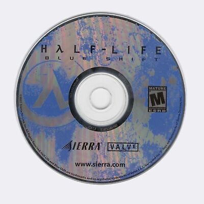A gently used Half-Life Blue Shift (2001) PC CD by Valve and Gearbox arrives in a protective paper sleeve, showcasing logo designs for Sierra and Valve. Rated Mature 17+.
