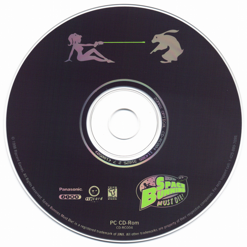 The CD artwork on a gently used paper sleeve depicts a woman aiming a green laser at a rabbit, featuring the title Space Bunnies Must Die and various logo trademarks.
