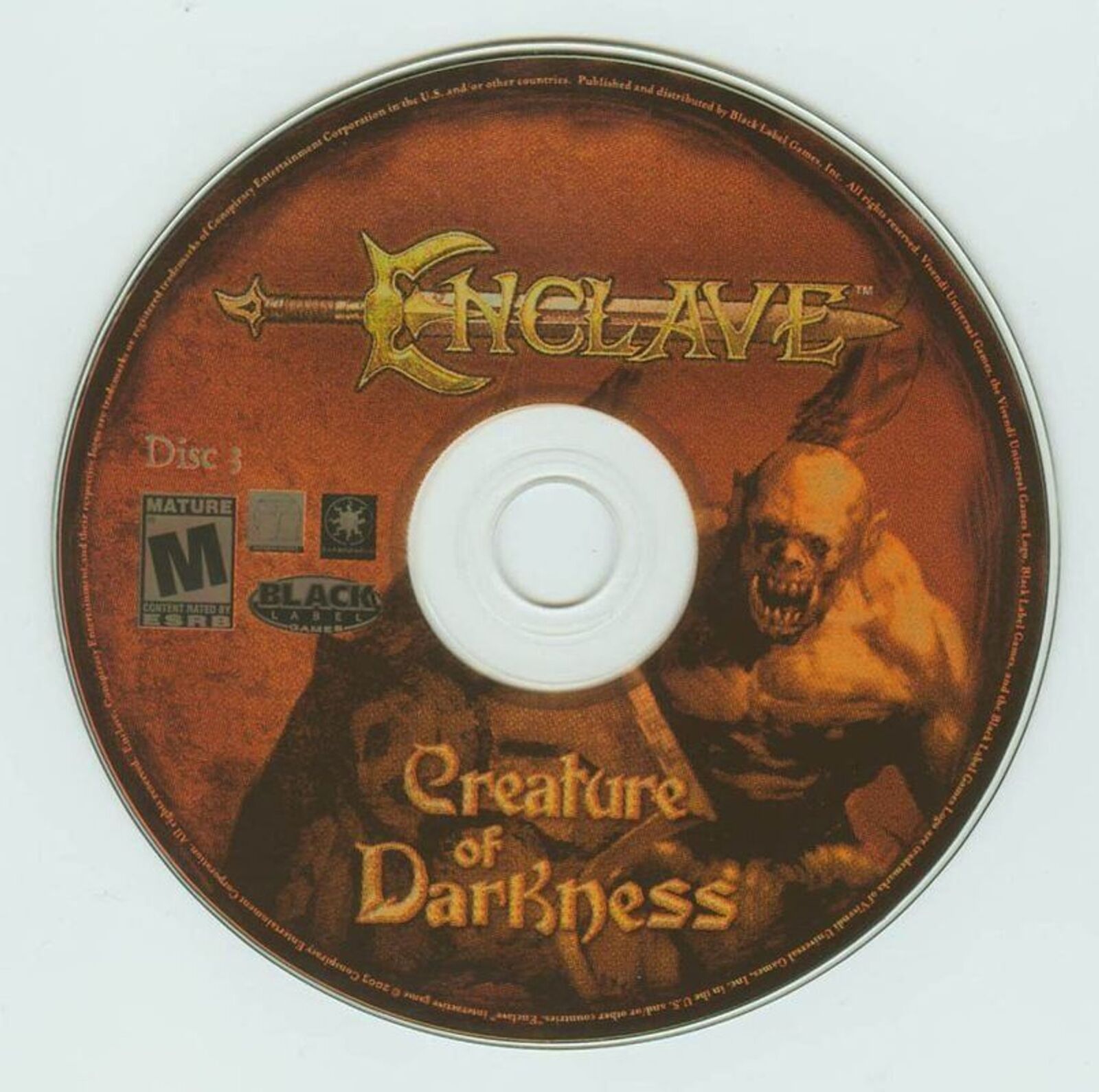 Gently used PC CD Enclave: Creature of Darkness in a paper sleeve features a menacing figure. Its rated Mature and showcases the Black Label Games and TDK logos, as seen in the stock photo.