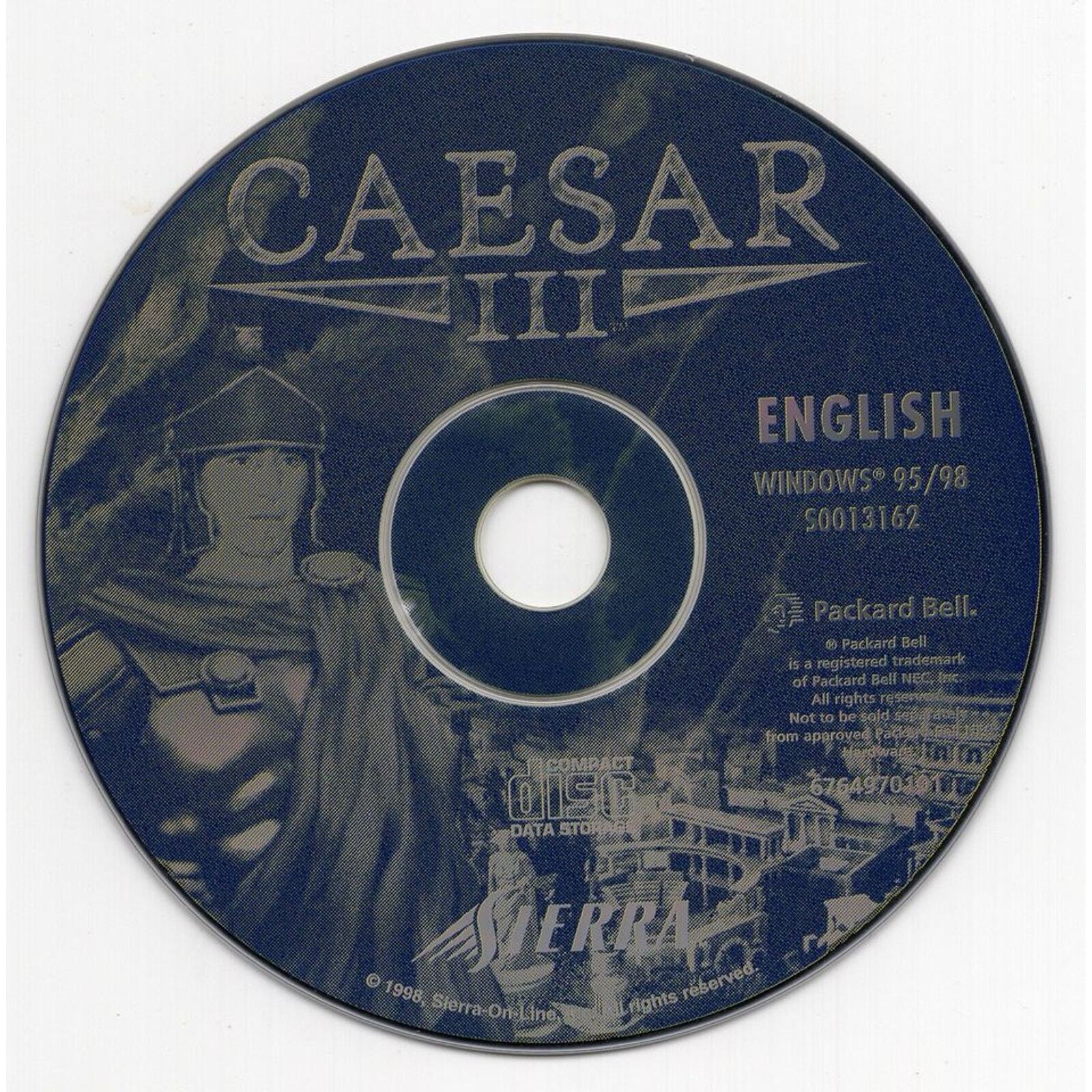 Caesar 3 Microsoft Windows PC CD features Roman soldier artwork on a gently used disc in a paper sleeve, compatible with Windows 95/98. It includes Packard Bell, Compact Disc, and copyright text.