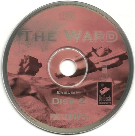 The image shows The Ward Microsoft Windows PC CD, Disk 2, featuring desert-like terrain and a building. Logos for On Deck Interactive and FragileBits suggest a sci-fi adventure centered around lunar seismic activities.